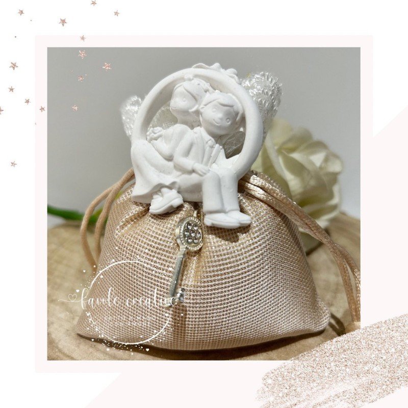 Sacchetto brillantino colore oro con sposini Sacchetto brillantino colore oro con sposini